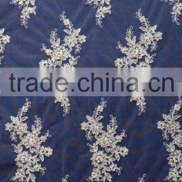 Guangzhou latest design hot selling warehouse lace fabric for garment