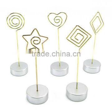 5 different shapes of golden memo clips with silver resinic base for tabletop use