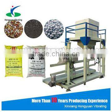 Semi-automatic bagging machine for fertilizer with packing scale