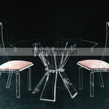 A Set Of Pink Acrylic Banquet Dining Table and Chairs Set
