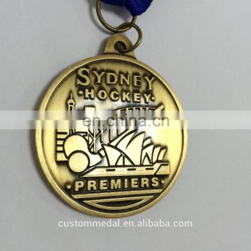 map logo medal in antique gold plating as commemorative personalized medal for champion