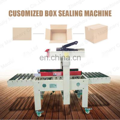 Automatic express boxes juice cartons sealing machine
