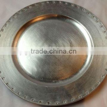 Silver charger plate with stones