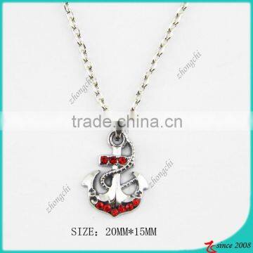 Red crystals anchor pendant necklace