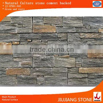 Concrete backed natural stone veneer for wall construction