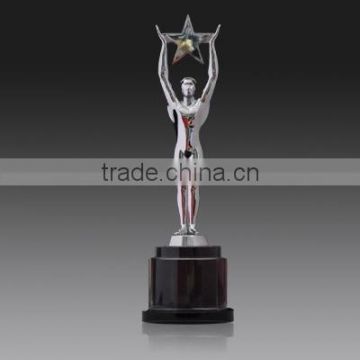 Oscar statuette hold star with black crystal base medals and trophies