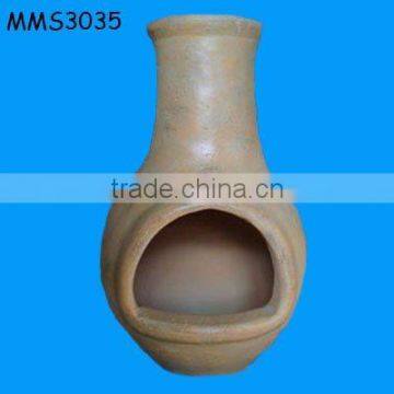 outdoor terracotta chimenea