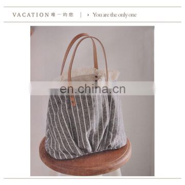 Elegant canvas bag with leather