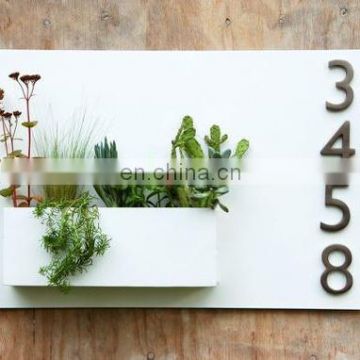 Powder coated white hanging planter with home depot house number