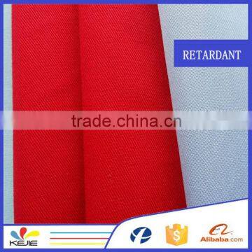 Green fire resistant fabric for coverall