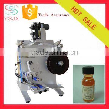 Manual Mini round bottles labeling machine