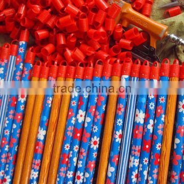 plastic covered wooden broom handle