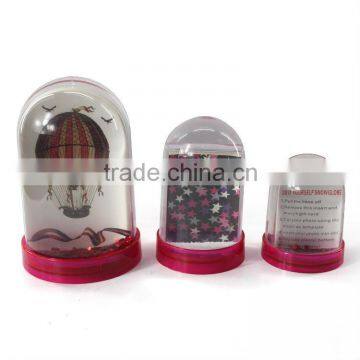 Plastic snow globe with photo insert