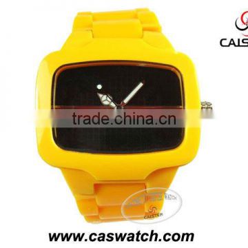 Wide yellow plastic watch with square case