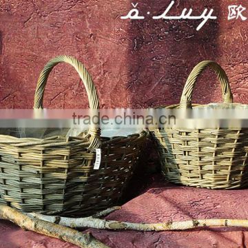 new design cheap oval wicker with long handle