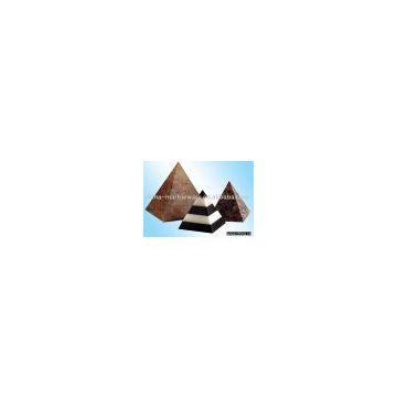 small carving of colorful pyramid (marble material)