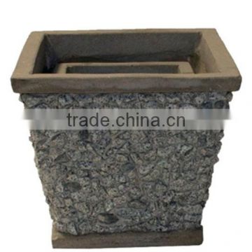 Light cement with stone planter