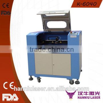 fabric 600*400mm desktop K-6040 manual co2 laser cutting machine for sale