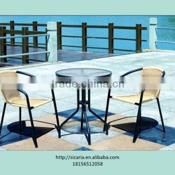 STEEL AND RATTAN OUTDOOR DINING SET WITH ONE TABLE AND TWO CHAIRS