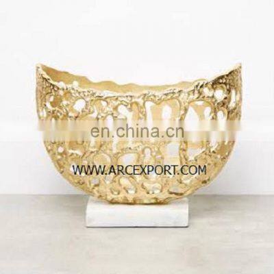 gold plated bowl with marble base