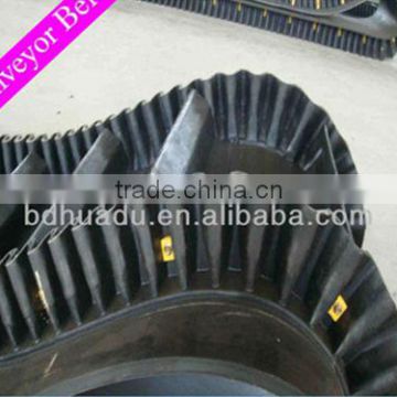 Sidewall conveyor belt manufacture