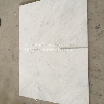 Carrara C white marble & tiles