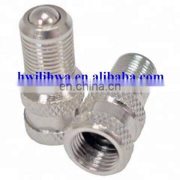 Multi inflate thru tire valve cap