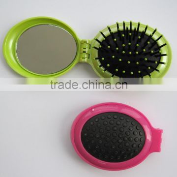 travel foldable comb pop-up brush and mirror.