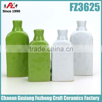 Bottle shaped ceramic vase with various color