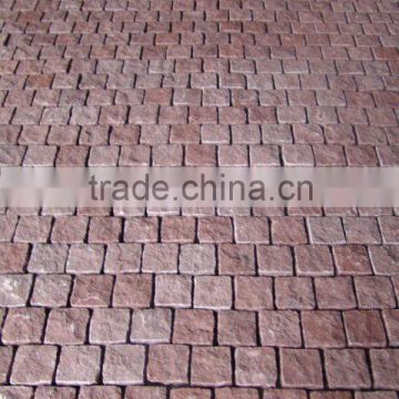 red porphyry cobbles with back meshed