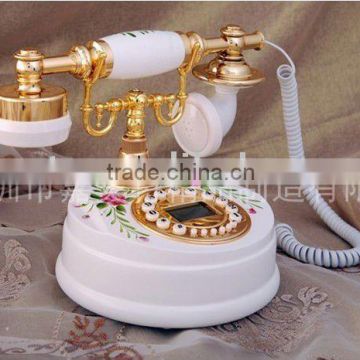white antique style wooden telephone with cid dispaly