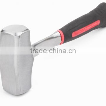 Forged one piece stone hammer with bi-color rubber handle