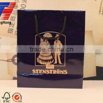 Good quality hot stamping and black color gift packaging paper bag with handles