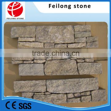 yellow quartzite culture stone with cement in back