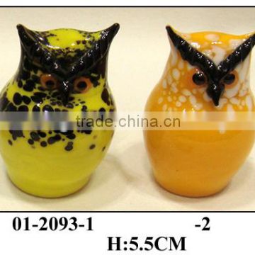 bright yellow glass owl shaped decoration with long eyebrow