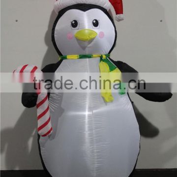 inflatable penguin with cane