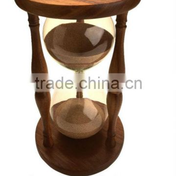 large sand timer with wooden frame