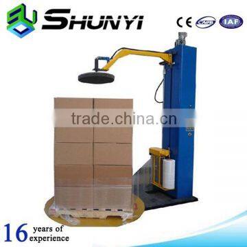 Heat shrink parcel wrapping machine