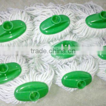 white cotton mop head with green plastic socket