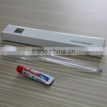 White transparent hotel toothbrush