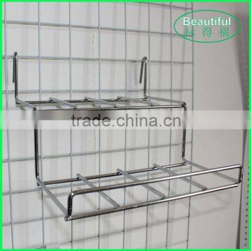 Shoe store display rack for meshwall