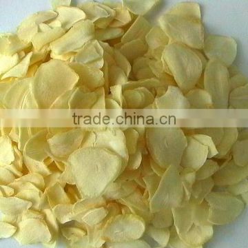 garlic flakes with root,yellow color,