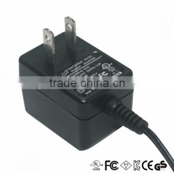 output 5v 2a power adapter input 100~240v ac 50/60hz