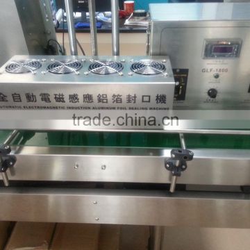 Factory supply automatic 4-head linear aluminum foil sealing machine for plastic bottles sale
