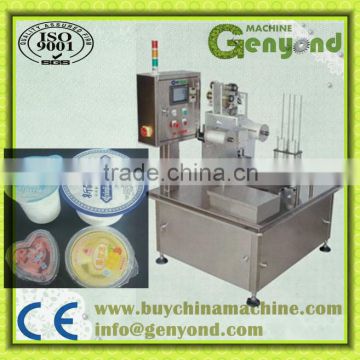 Rotary juice cup filling and sealing machine