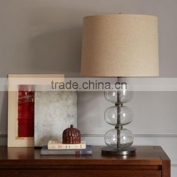0627-11 Strung together like beads on a necklace, the Abacus Glass act Clear Table Lamp