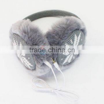 Creative mobile knitted gray earmuff with speaker
