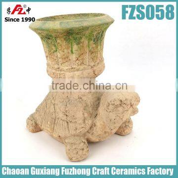 Terracotta tortoise shaped decorative flower pot