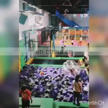 Professional adults jumping indoor commercial trampoline park equipment