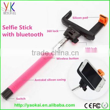 2015 hot sell wireless bluetooth selfie stick with bluetooth shutter button rechargeable battery